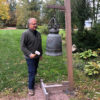 Large bronze bell on custom crafted stand