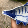 Blue and white fish condiment plates