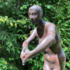 Bronze nude holding dove
